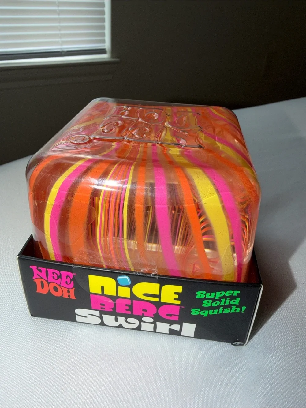 Nice Berg Swirl Solid Squish Toy - Orange Pink Yellow Swirl